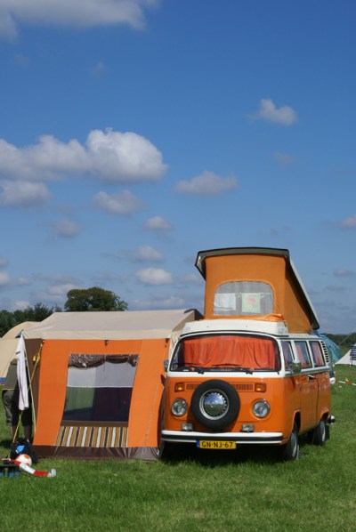 A latebay Kombi with a side tent.