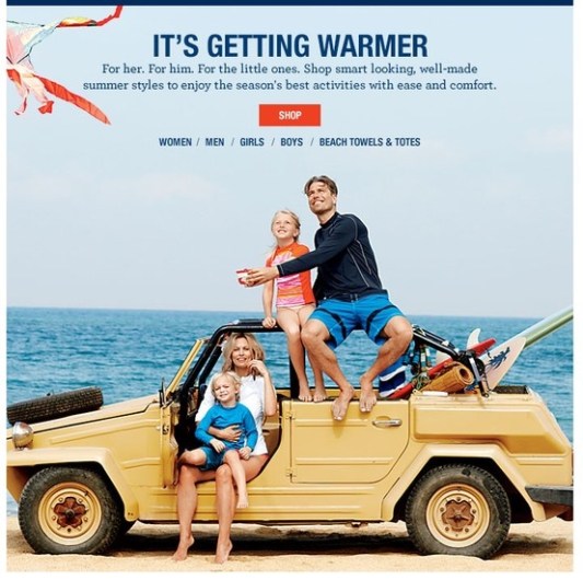 An on-line shopping advertising: a family with a VW Safari on a beach...